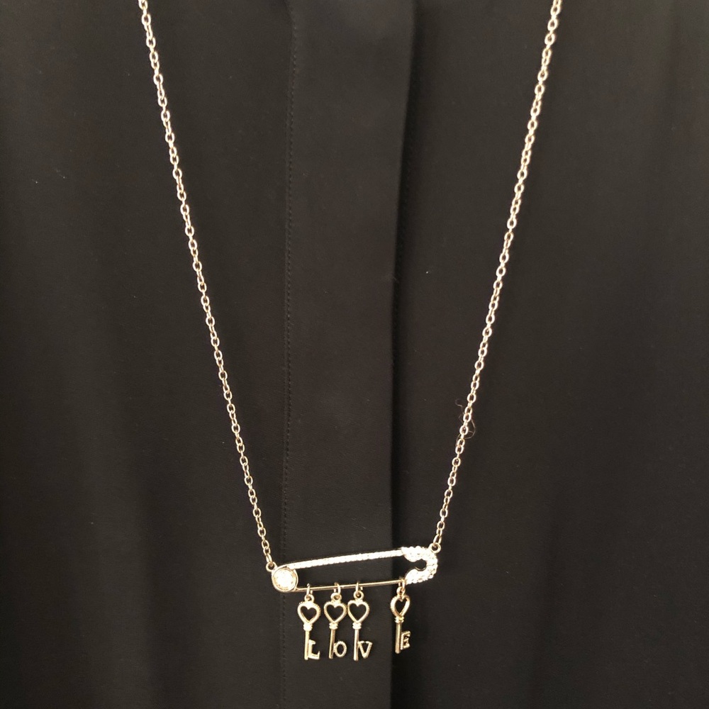 LOVE on a pin necklace